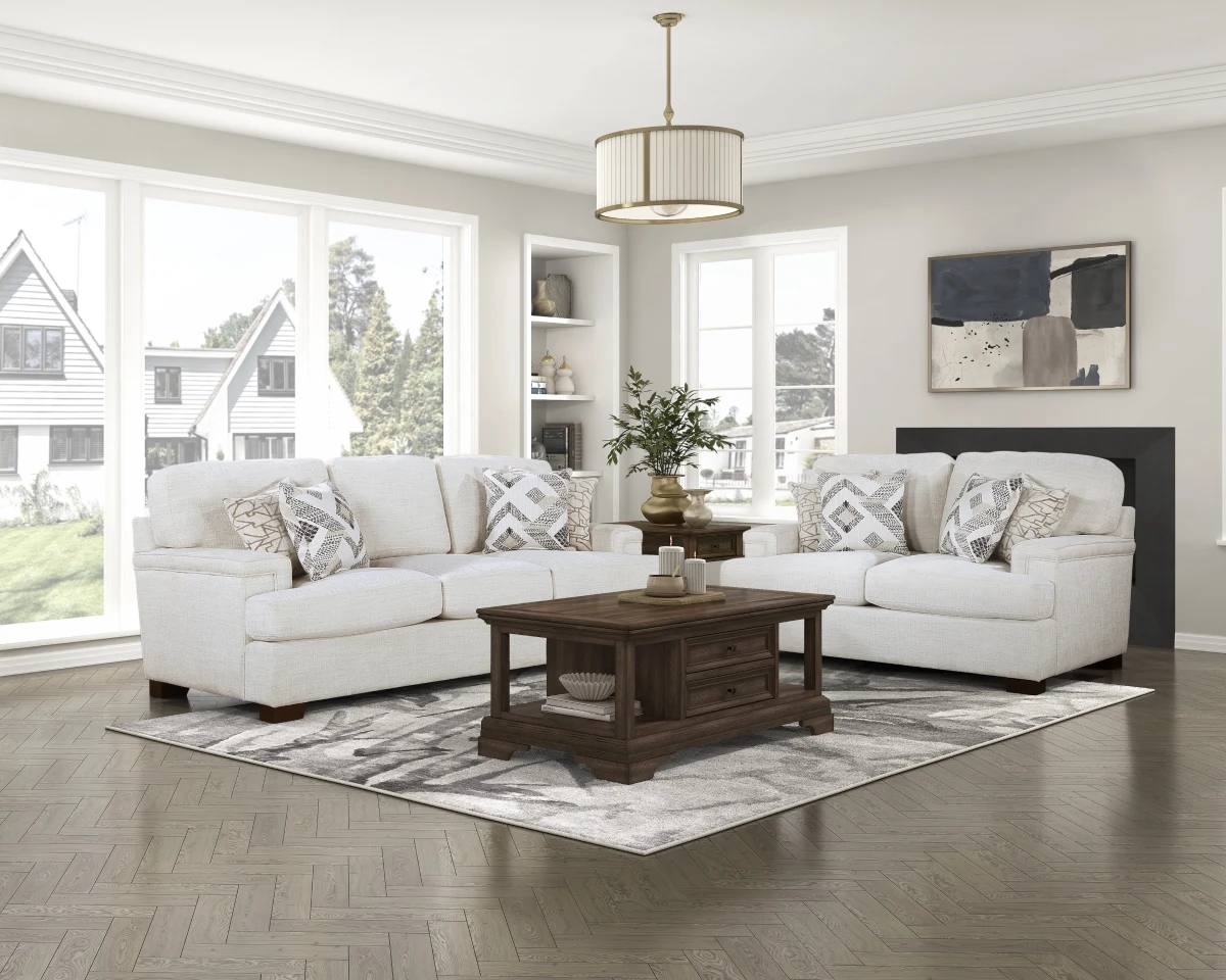 Cream Orson sofa and loveseat in a furnished living room