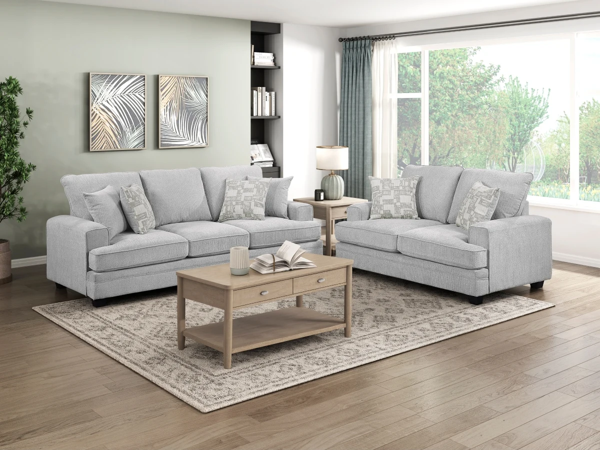 Sarah sofa and loveseat in a neutral furnished living room